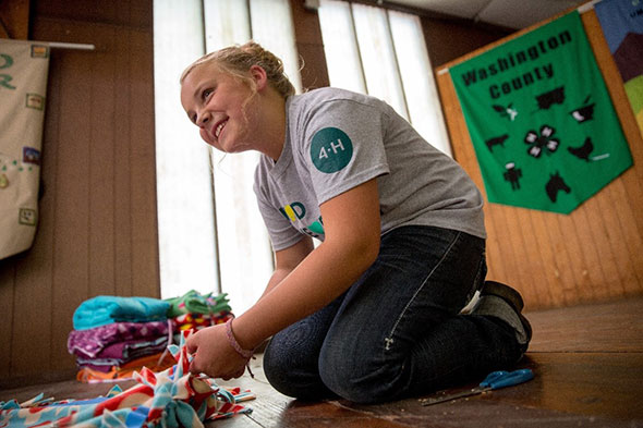 4-H-er holding fabric